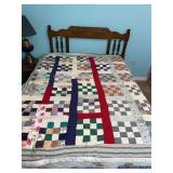 home made Patchwork quilt with floral and striped fabric