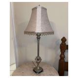 Metal table lamp with beaded shade