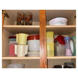 Shelf of Vintage Tupperware and storage containers