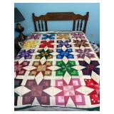 home made star pattern patchwork quilt