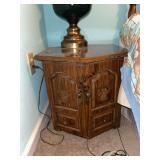 Wooden hexagonal nightstand with carved doors