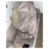 Inflatable air mattress in plastic storage tote