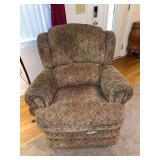 Upholstered patterned recliner armchair