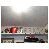 CHristmas Decor, Metal Stocking Hangers, Crochet on top shelf