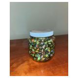 Glass marbles in jar