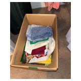 Box of assorted fabric pieces and remnants