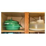 Tupperware on middle shelf-Pie saver, Burger press, green colander, slicer