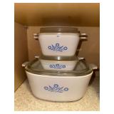 3 Corningware blue flower baking dishes Largest has glass lid- smaller 2 have plastic lids