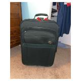 American Tourister green rolling luggage