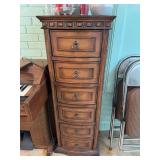 Slender bow front chest