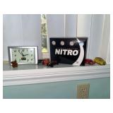 golf balls, toy cars, clock