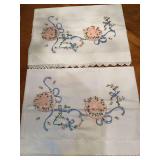 Pair of hand embroidered pillowcases set with crocheted edge