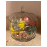 Cookie Cutters in glass pumpkin jar