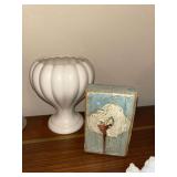 White ceramic pedestal vase and cotton boll block decor