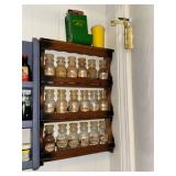 Vintage spice rack with jars and John Deere match holder
