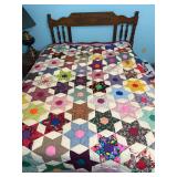 Home made patchwork quilt with star pattern