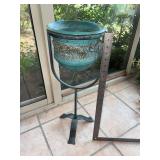 Metal plant stand with ceramic planter