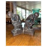 The thinker bookends chalkware or ceramic