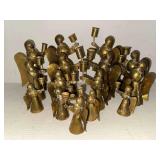 Collection of vintage folk art hand crafted brass angel candle holders