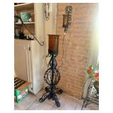 Wrought iron floor hurricane lantern and matching wall sconce