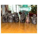 Vintage robed monk carvings