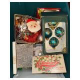 Box of Christmas ornaments
