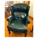 Bradington Young Green Leather Wingback Recliner with brass nailhead trim and carved ball and claw feet