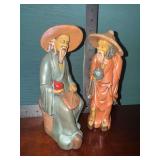 2 ceramic Chinese Mudmen figurines