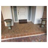 Pair of large cast iron garden urn planters BUYER IS RESPONSIBLE FOR REMOVAL