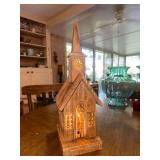 Rustic wooden lighted church