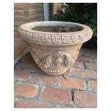 Concrete fruit garland planter on porch BUYER IS RESPONSIBLE FOR REMOVAL