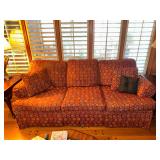 Clayton Marcus three cushion red medallion sofa