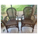 Pair of wicker chairs- right one has a little unraveling on legs
