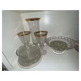 Glass bowls, flower frog and gold rim stemware