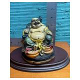 Had painted resin Laughing Buddha