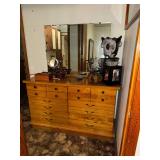 Dresser with stacked drawers and mirror