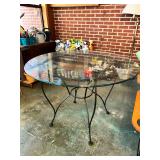 Round Glass Top Dining Table with Black Metal Base