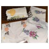 Hand embroidered placemats and table runners