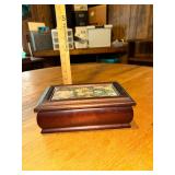 Jewelry box with needle point lid