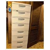 8 drawer storage tower full of sewing patterns and supplies and crafting supplies
