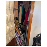 Contents of living room closet- handicap items, clothes