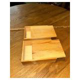 2 wooden boxes with slide tops