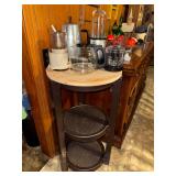 Round shelf with coffee pots and food mixers