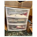 Storage box with fabrics, tablecloths and linens