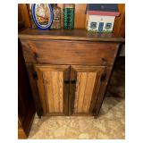 Rustic cabinet with faux drawer and beadboard doors