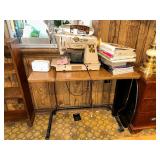 Singer Model 500A Slant-O-Matic Rocketeer sewing machine with sewing table and books