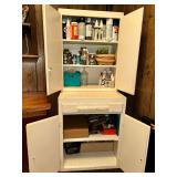 2 piece painted cupboard full of craft supplies in craft room