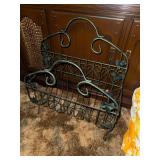 Green metal magazine rack