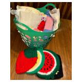 Basket of vintage linens- crochet hot pads, doilies, embroidered linens and more