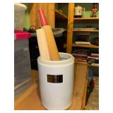 2 rolling pins in flour canister